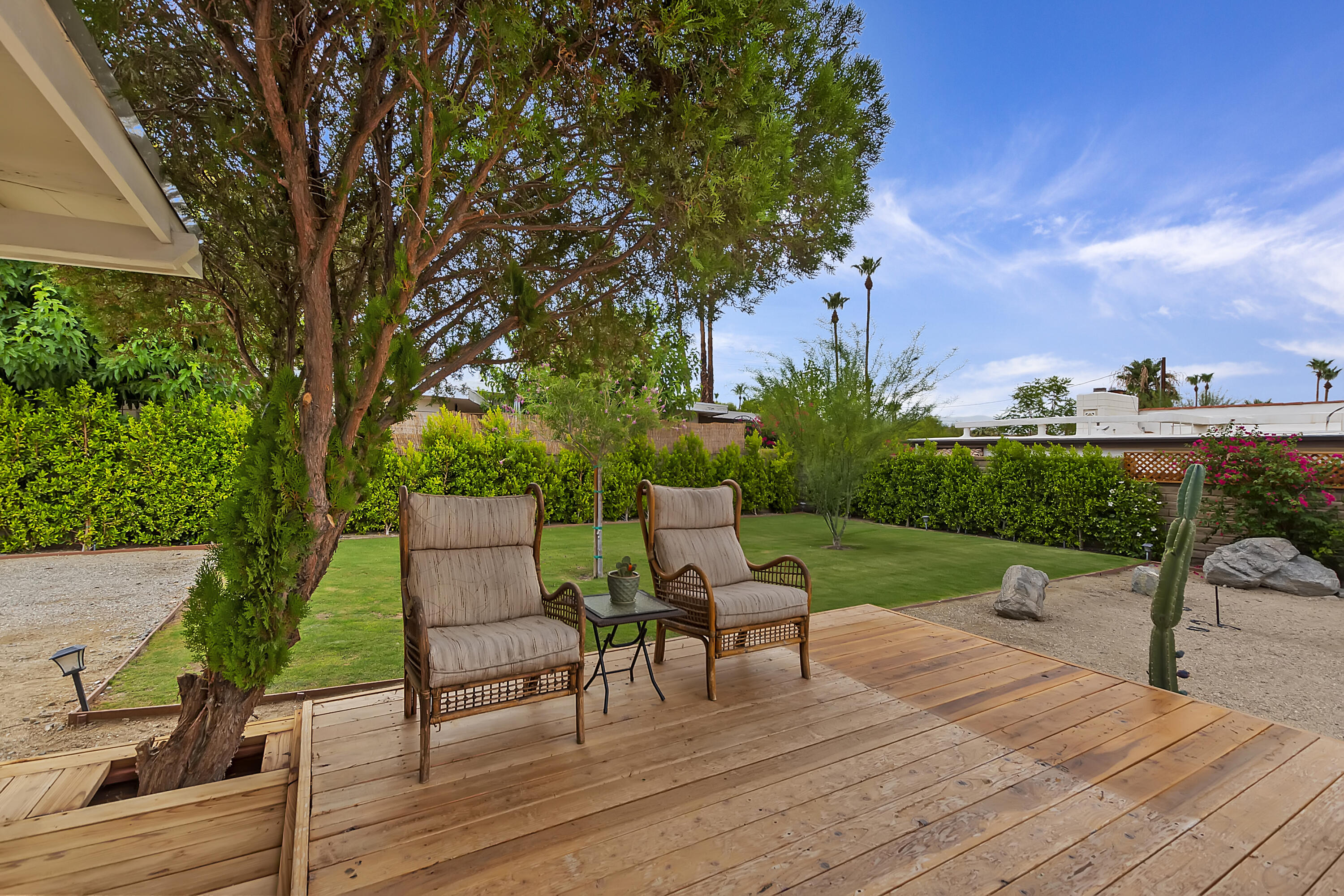 38957 Miller Lane Cathedral City, CA 92234 - Photo 28 of 34 a view of a table and chairs in the patio