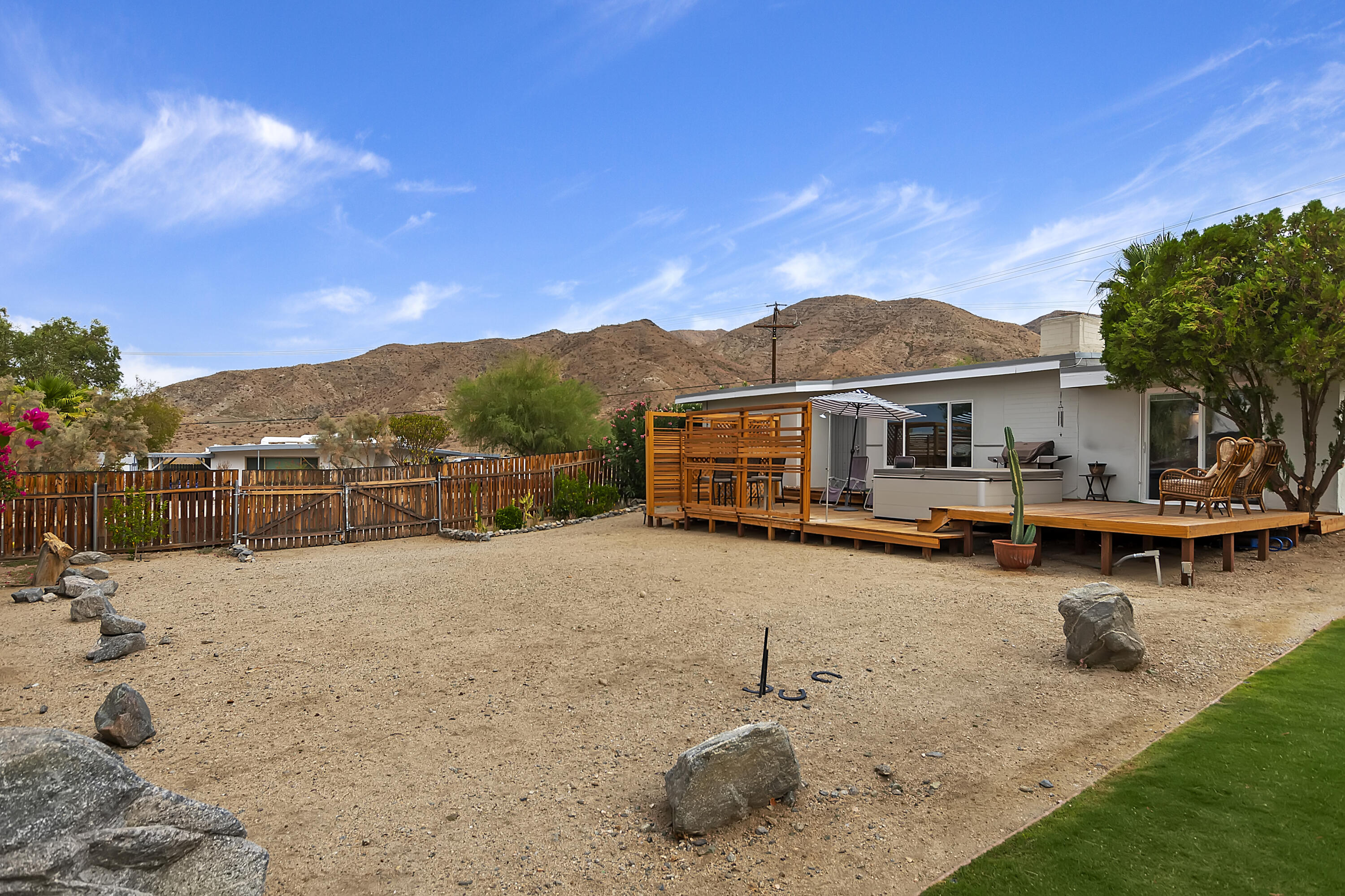 38957 Miller Lane Cathedral City, CA 92234 - Photo 30 of 34 a view of a house with swimming pool and sitting area