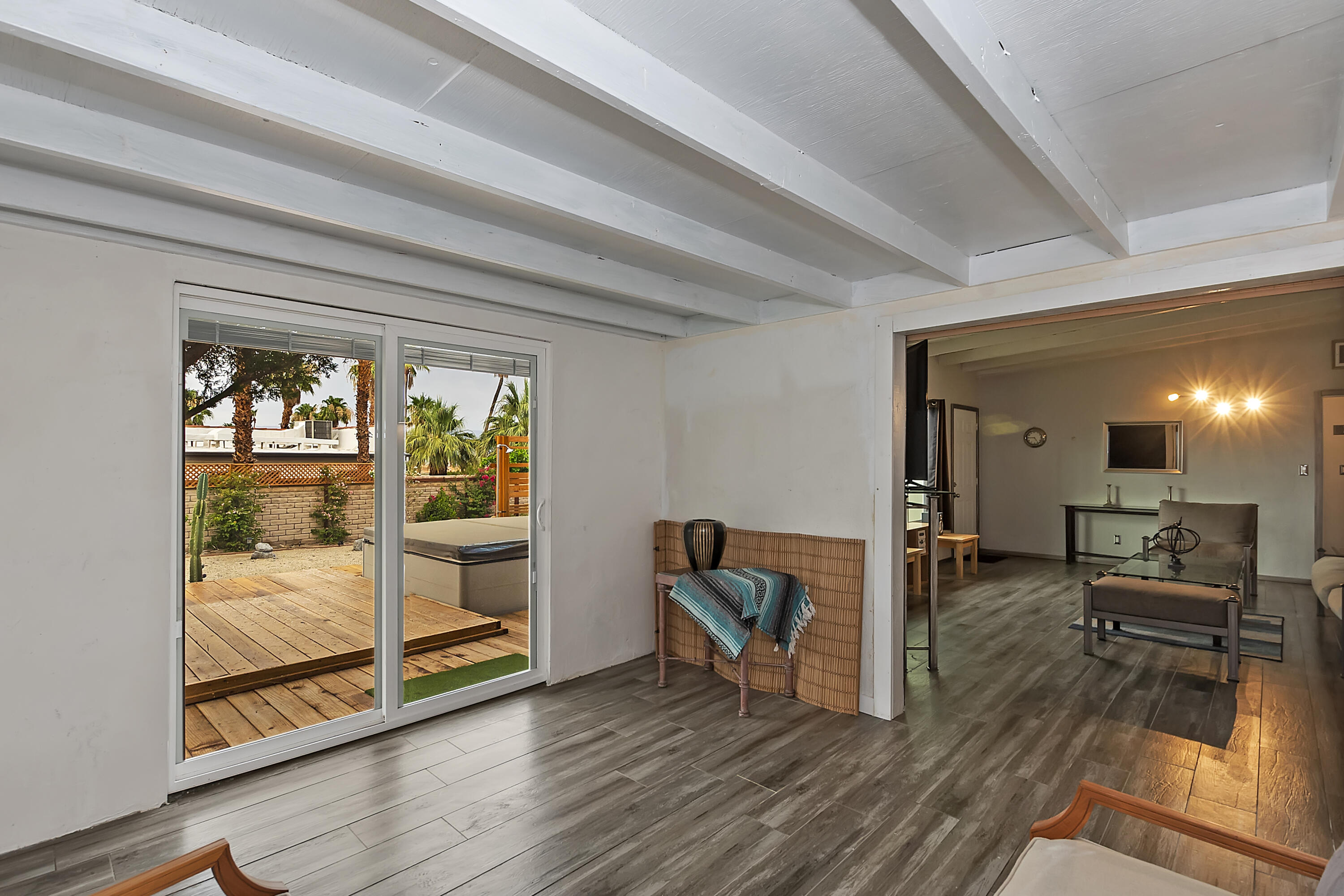 38957 Miller Lane Cathedral City, CA 92234 - Photo 10 of 34 a living room with furniture and a gate