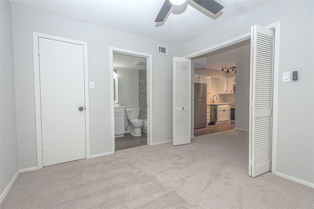 3022 Forest Lane, Unit 308 Dallas, TX 75234 - Photo 6 of 8 Walk-in closet and ensuite Bath