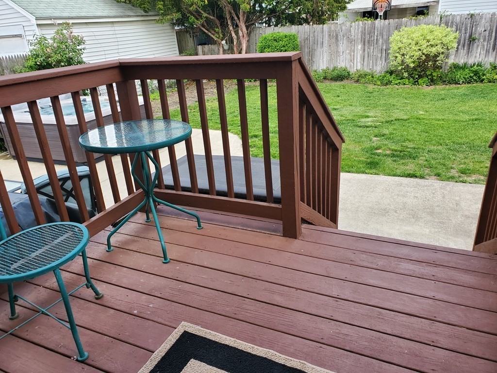 61 Windemere Street Springfield, MA 01104 - Photo 12 of 42 a view of a two chairs in the deck
