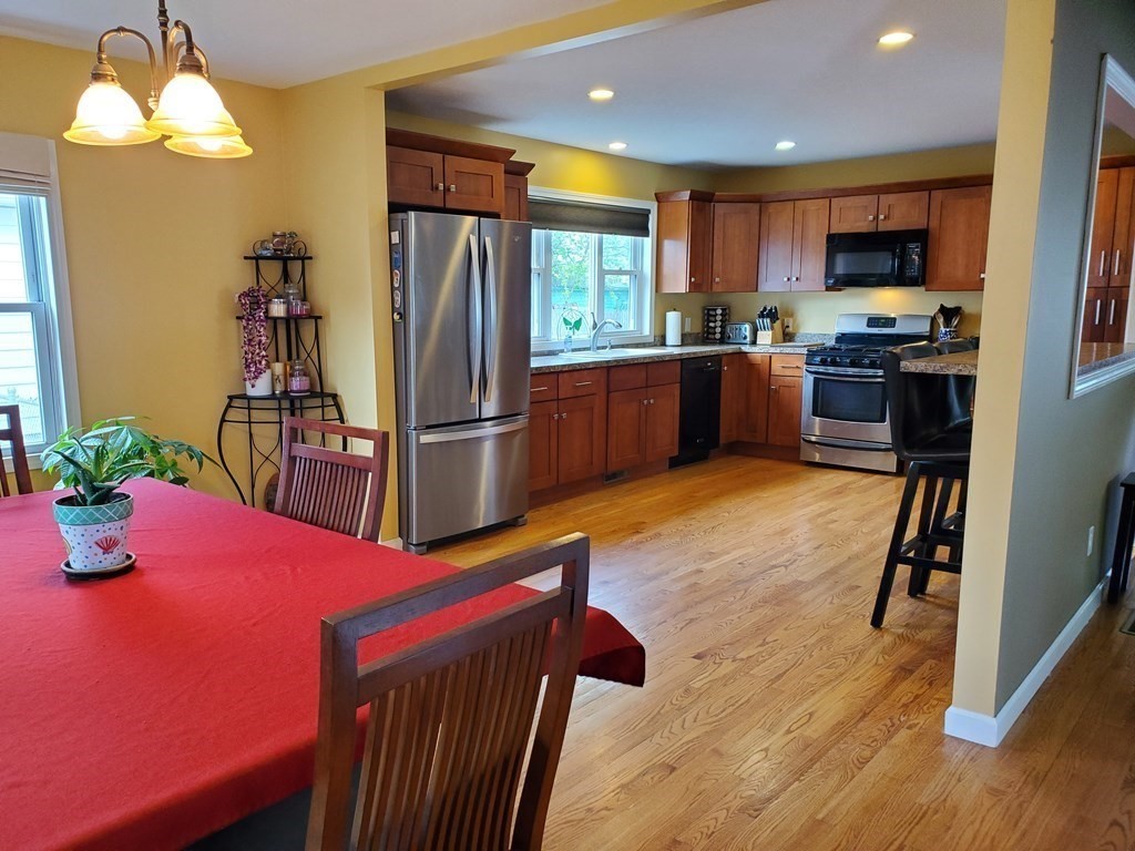 61 Windemere Street Springfield, MA 01104 - Photo 20 of 42 a kitchen with refrigerator and microwave