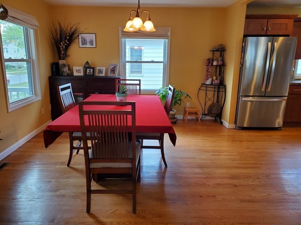 61 Windemere Street Springfield, MA 01104 - Photo 21 of 42 a view of a dining room with furniture window and wooden floor