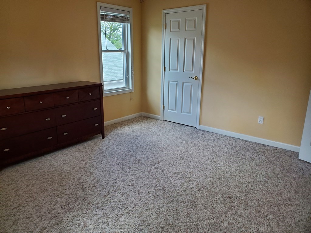 61 Windemere Street Springfield, MA 01104 - Photo 33 of 42 an empty room with windows and closet