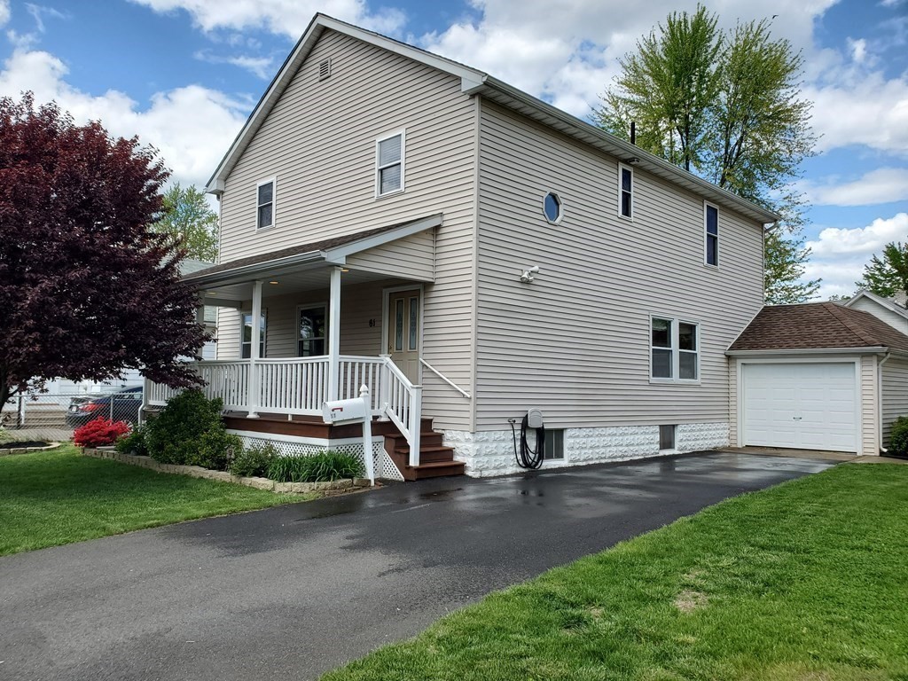 61 Windemere Street Springfield, MA 01104 - Photo 4 of 42 a front view of house with yard