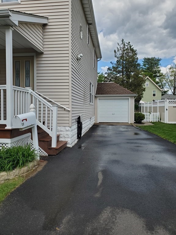 61 Windemere Street Springfield, MA 01104 - Photo 5 of 42 front view of a house with a yard