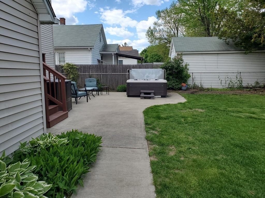 61 Windemere Street Springfield, MA 01104 - Photo 7 of 42 a view of backyard with a garden and plants