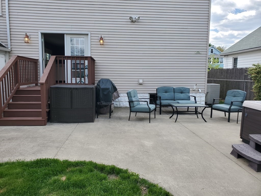 61 Windemere Street Springfield, MA 01104 - Photo 8 of 42 a view of a terrace with sitting area