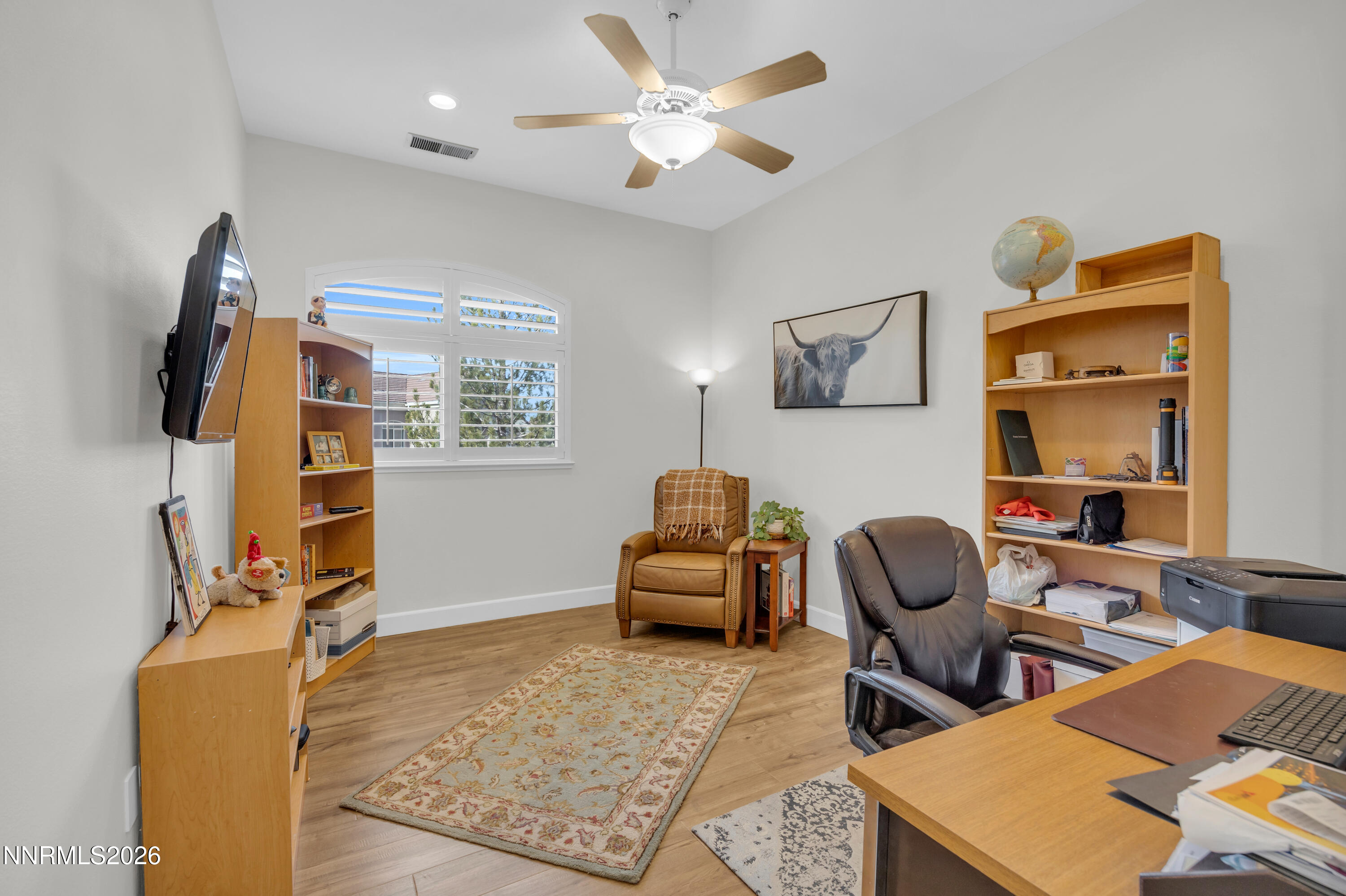 9900 Wilbur May Parkway, Unit 3903 Reno, NV 89521 - Photo 15 of 37 a living room with furniture and a flat screen tv