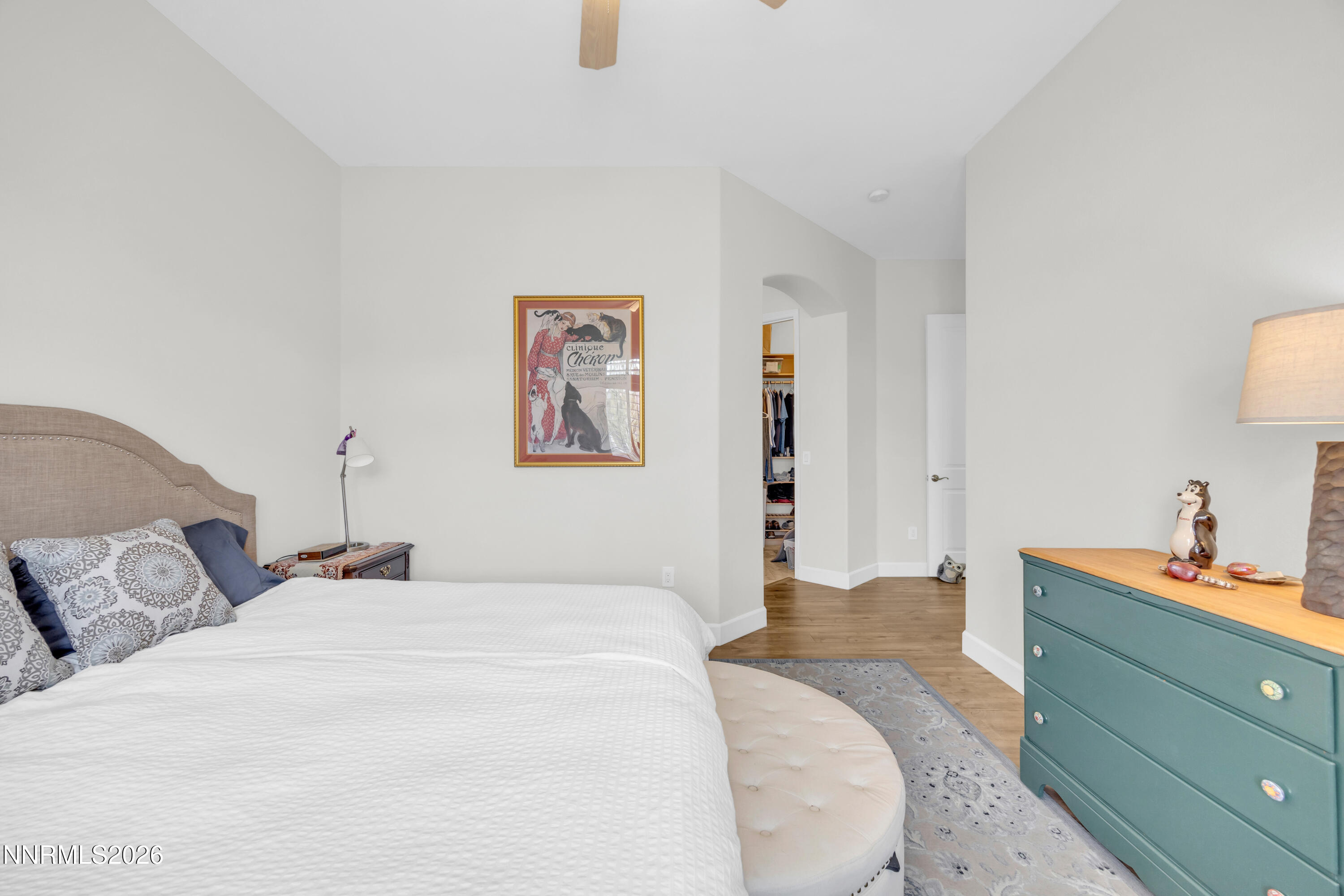 9900 Wilbur May Parkway, Unit 3903 Reno, NV 89521 - Photo 17 of 37 a bedroom with a bed and a lamp on dresser