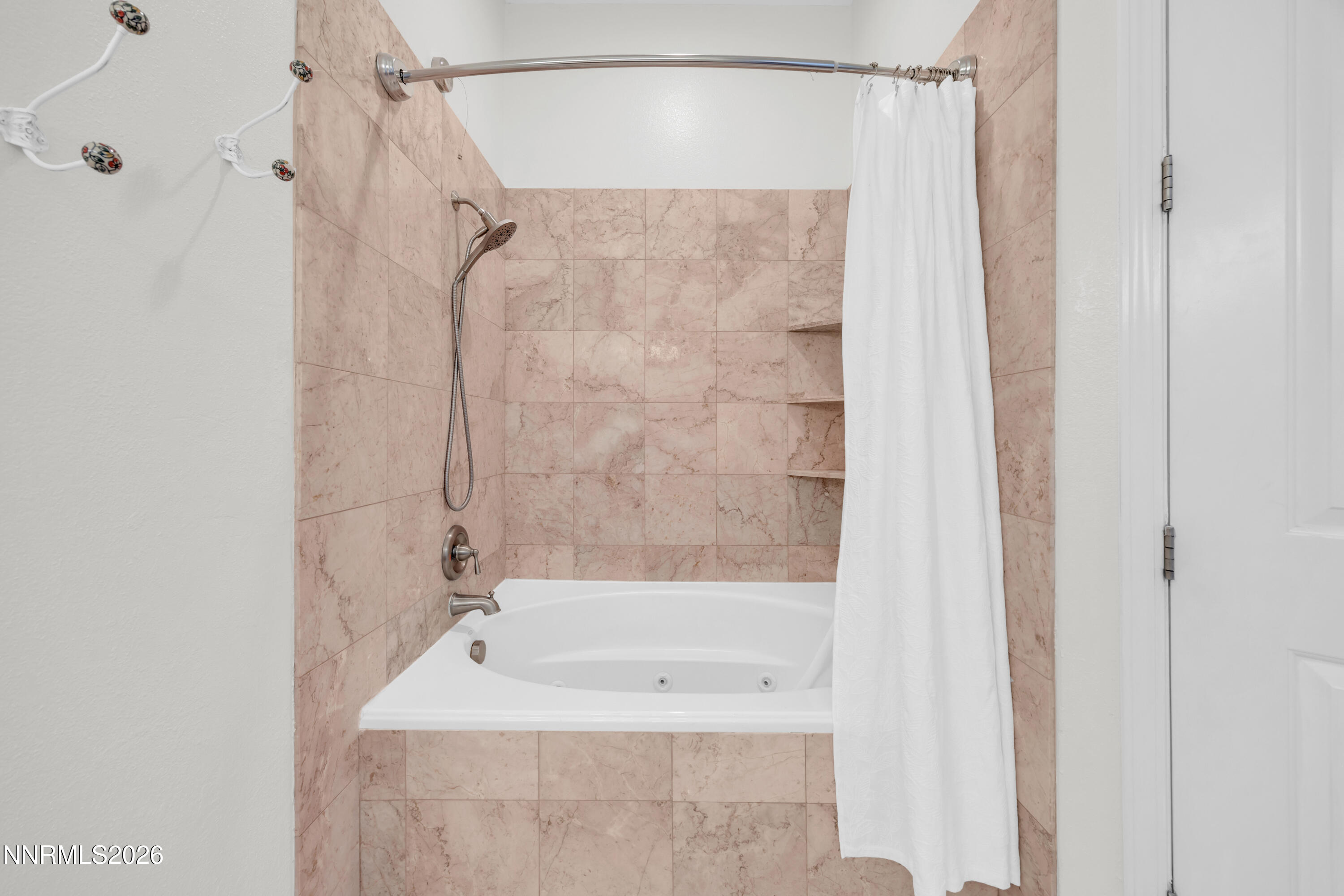 9900 Wilbur May Parkway, Unit 3903 Reno, NV 89521 - Photo 20 of 37 a bathroom with a shower and a sink