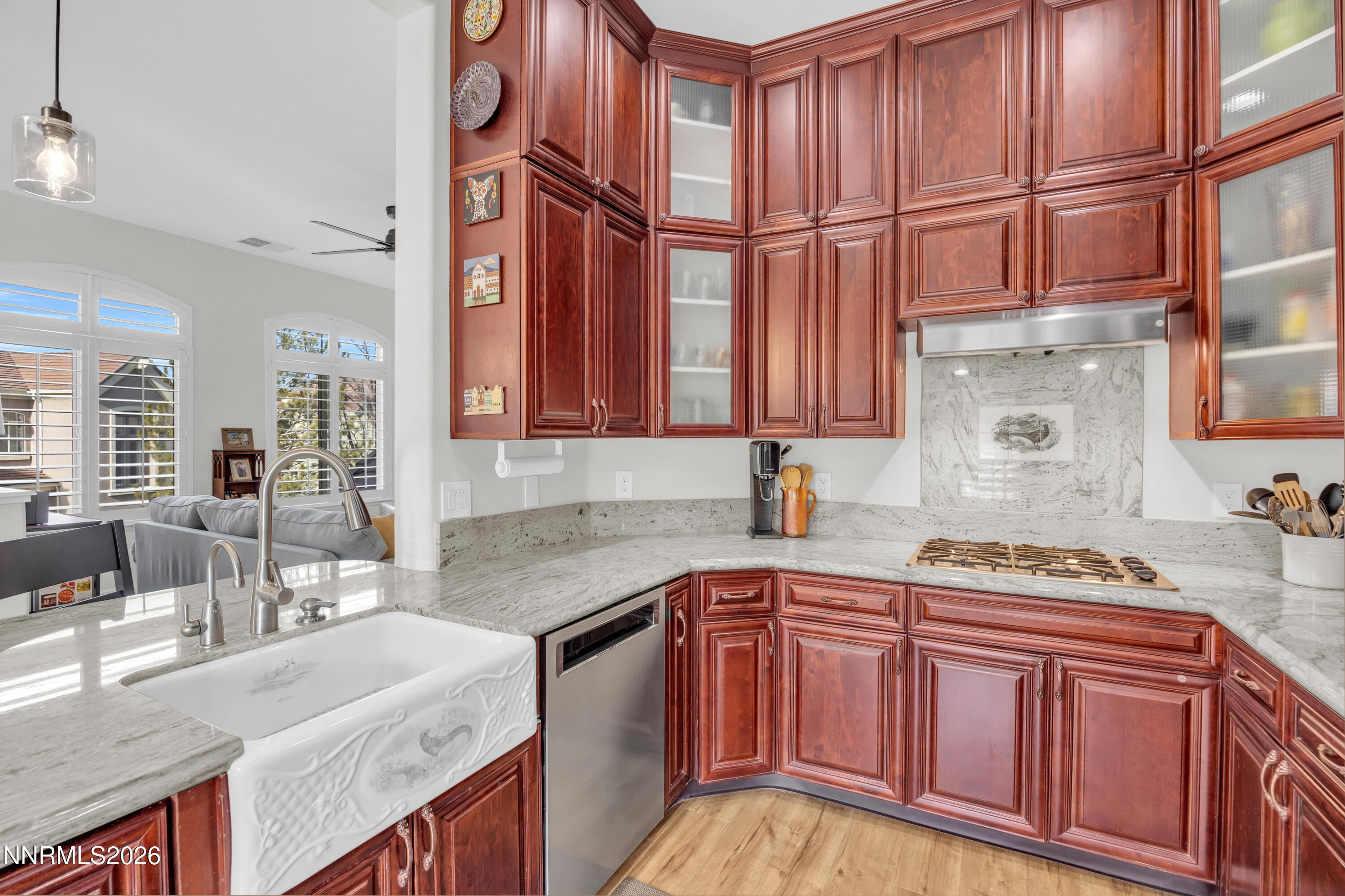 9900 Wilbur May Parkway, Unit 3903 Reno, NV 89521 - Photo 8 of 37 a kitchen with stainless steel appliances granite countertop a sink stove and cabinets