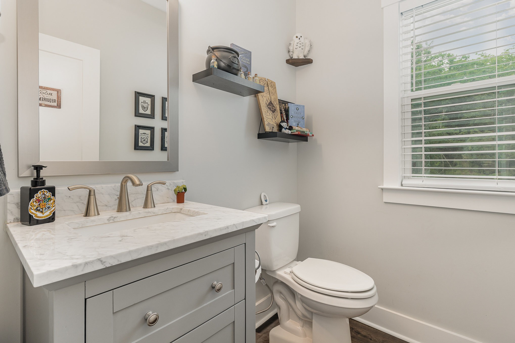 515 Vesta Road Lebanon, TN 37090 - Photo 13 of 31 a bathroom with a granite countertop toilet sink and mirror