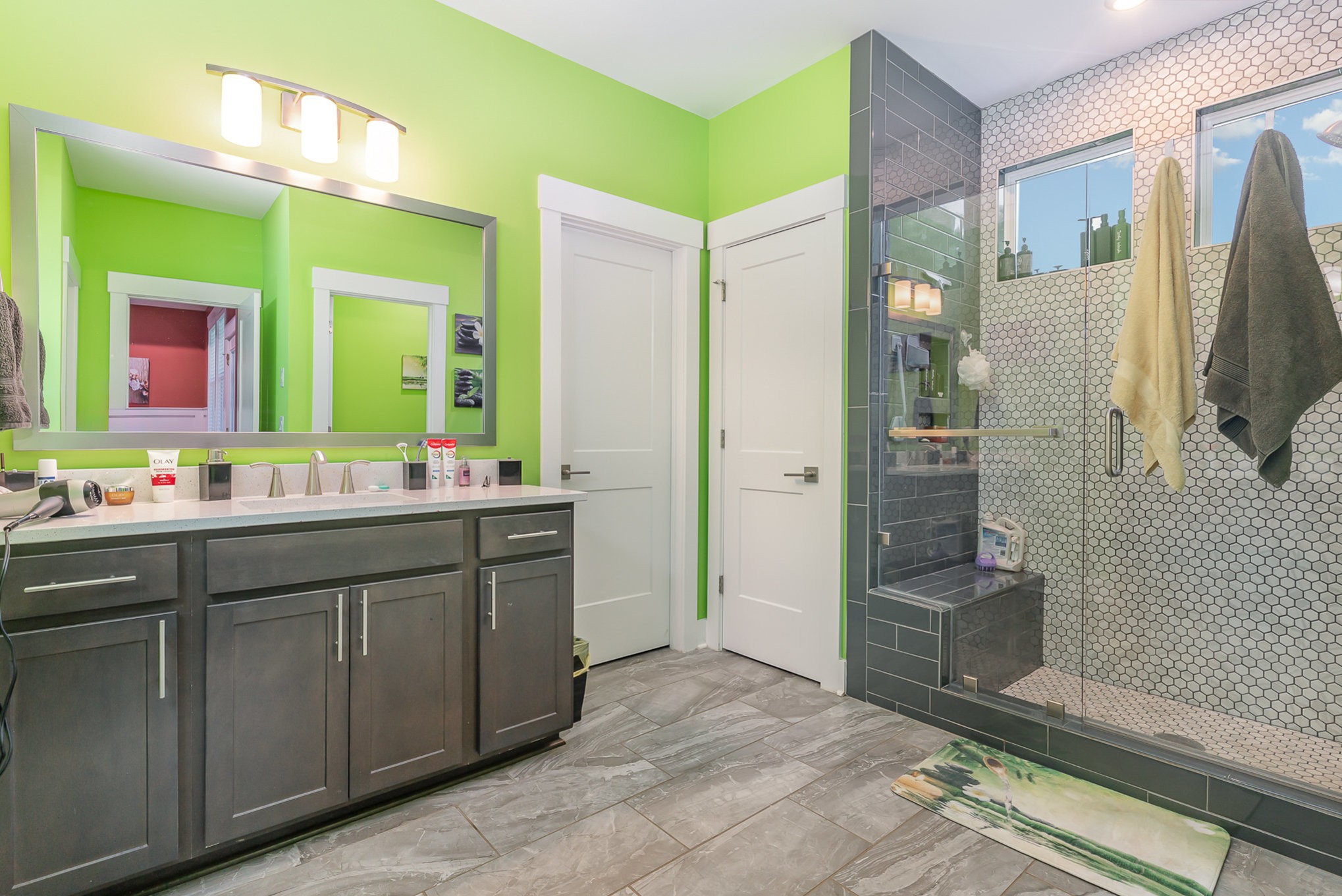 515 Vesta Road Lebanon, TN 37090 - Photo 18 of 31 a bathroom with a double vanity sink mirror and shower