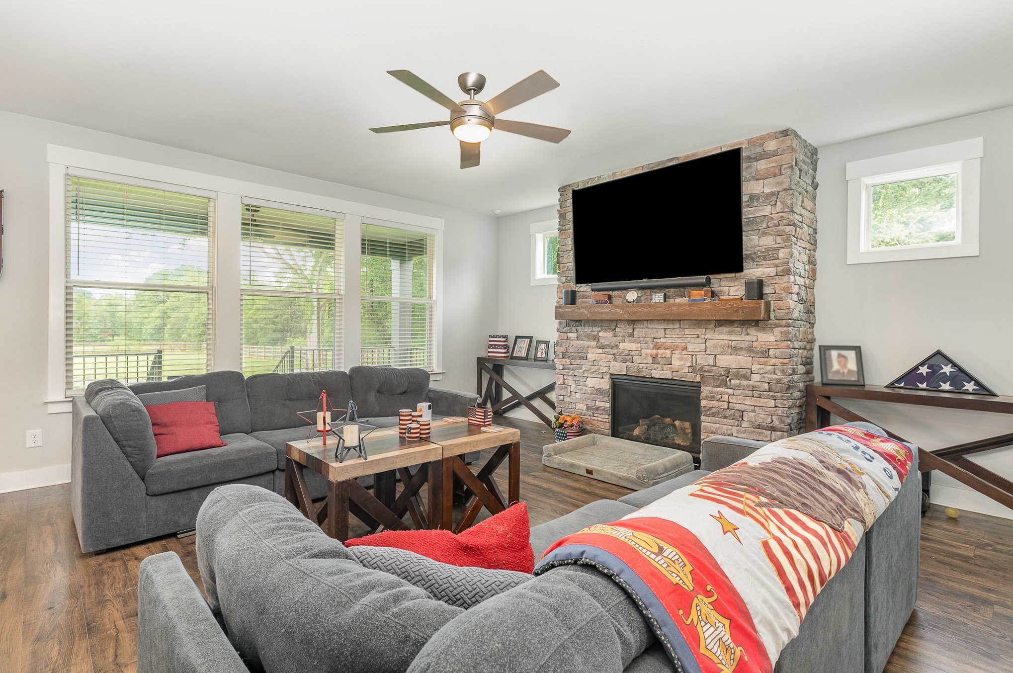 515 Vesta Road Lebanon, TN 37090 - Photo 4 of 31 a living room with furniture fireplace and a flat screen tv