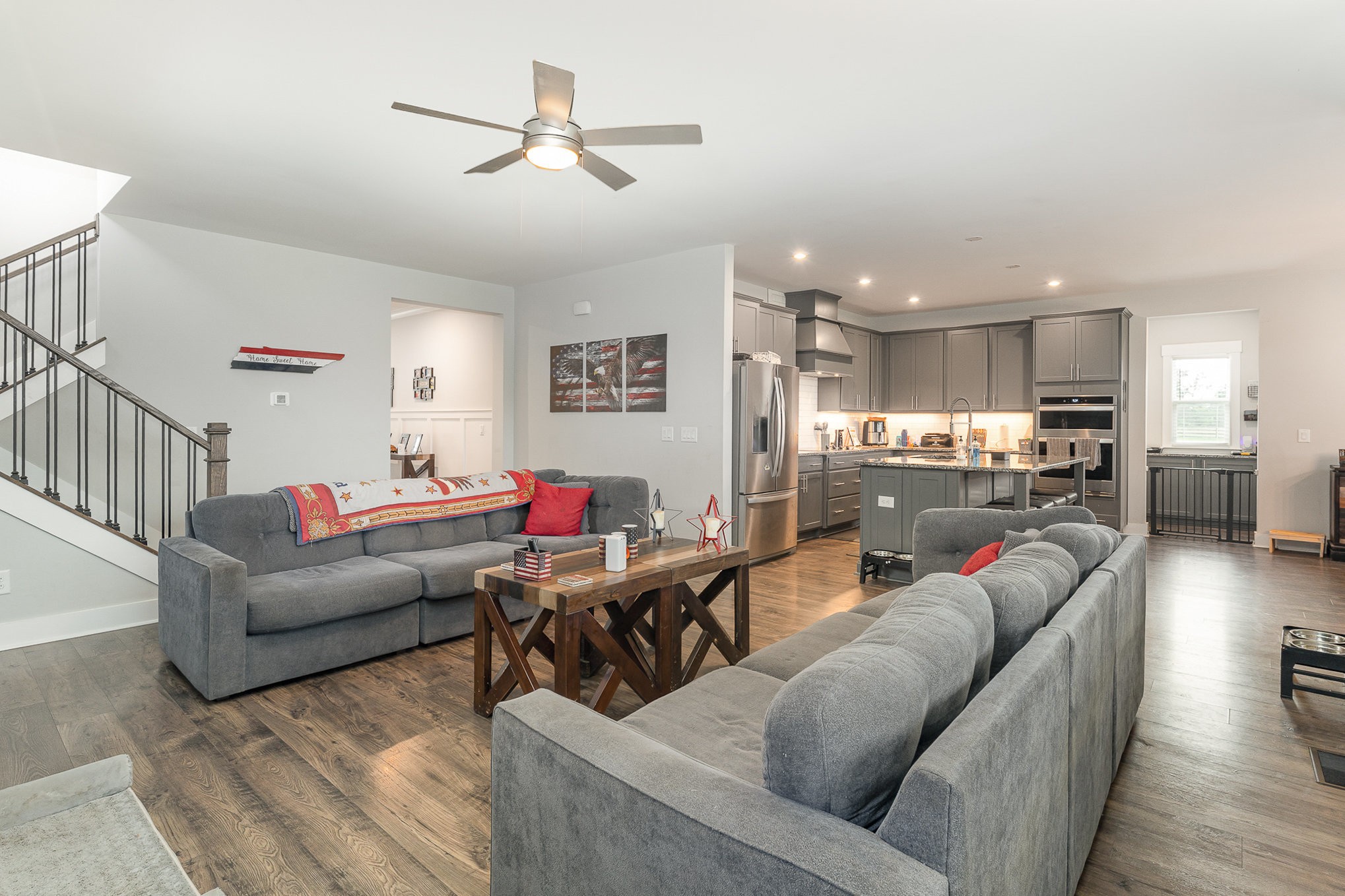 515 Vesta Road Lebanon, TN 37090 - Photo 5 of 31 a living room with furniture kitchen view and a wooden floor