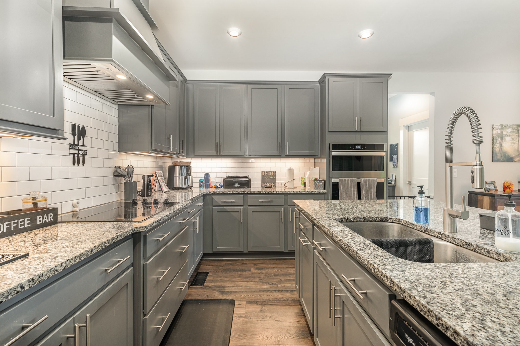 515 Vesta Road Lebanon, TN 37090 - Photo 9 of 31 a kitchen with kitchen island granite countertop a sink stainless steel appliances and cabinets