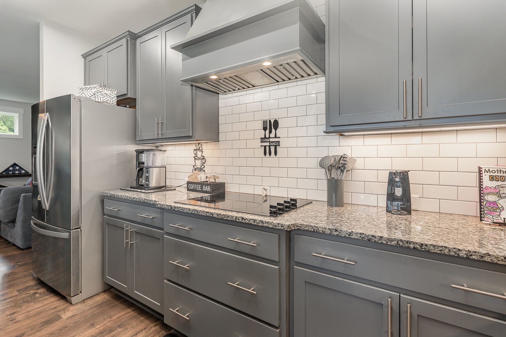 515 Vesta Road Lebanon, TN 37090 - Photo 10 of 31 a kitchen with stainless steel appliances granite countertop a sink stove and refrigerator