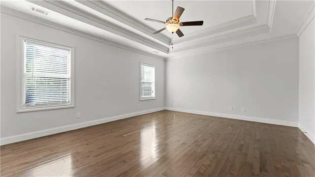a bathroom with a bathtub and a window
