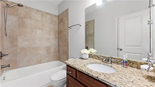 a bathroom with a sink and bathtub