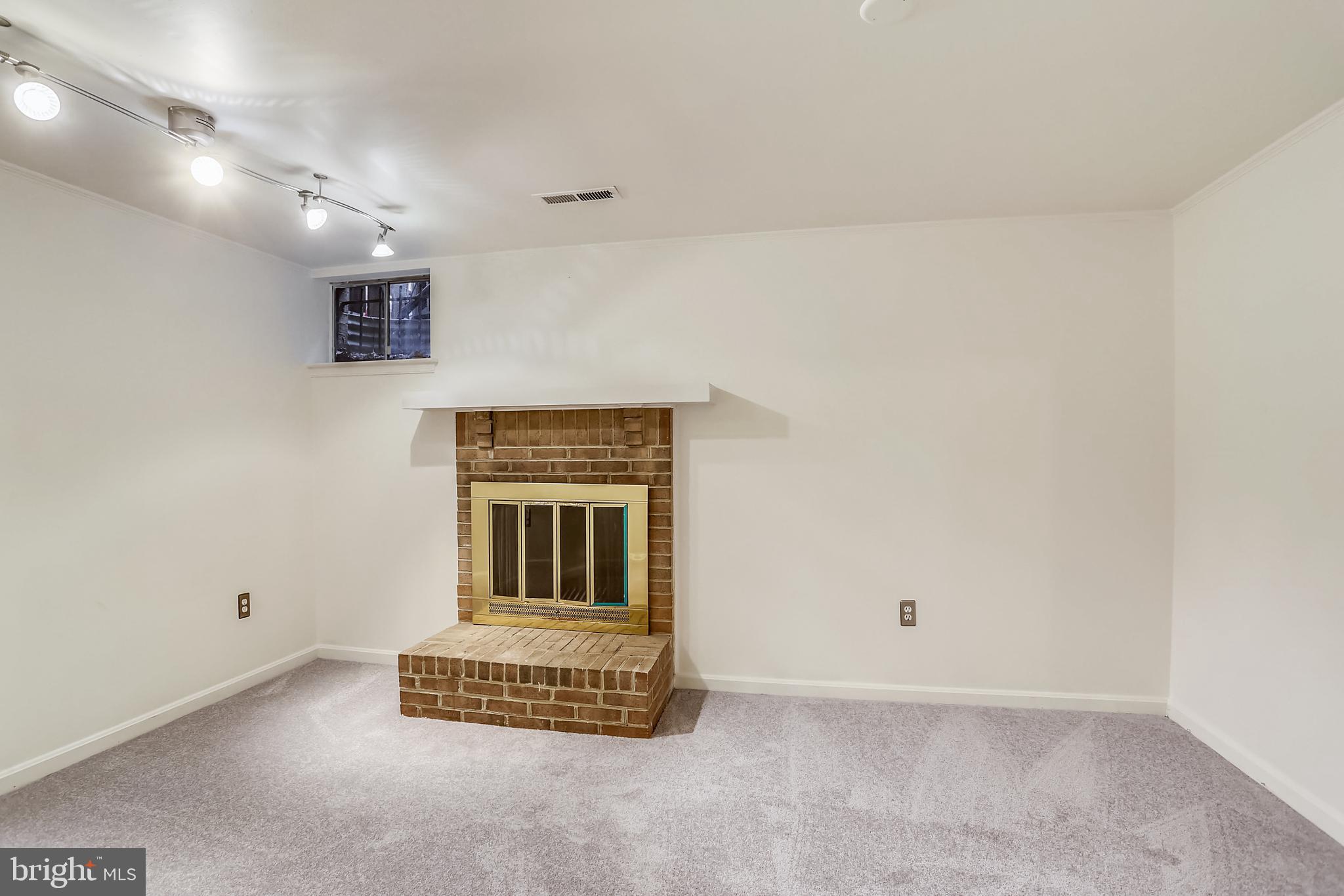 2113 Derby Ridge Lane, Unit 24 Silver Spring, MD 20910 - Photo 27 of 38 Family room with fireplace