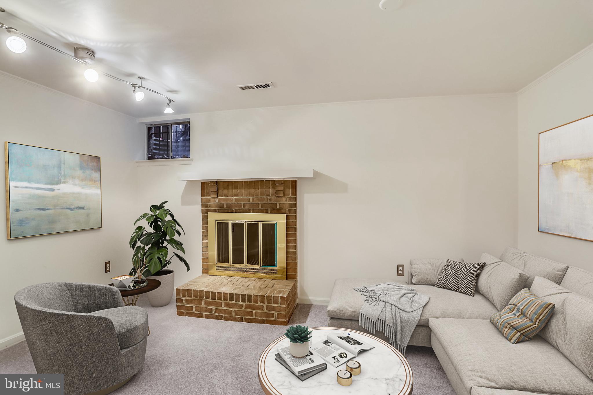 2113 Derby Ridge Lane, Unit 24 Silver Spring, MD 20910 - Photo 28 of 38 Lower level family room staged