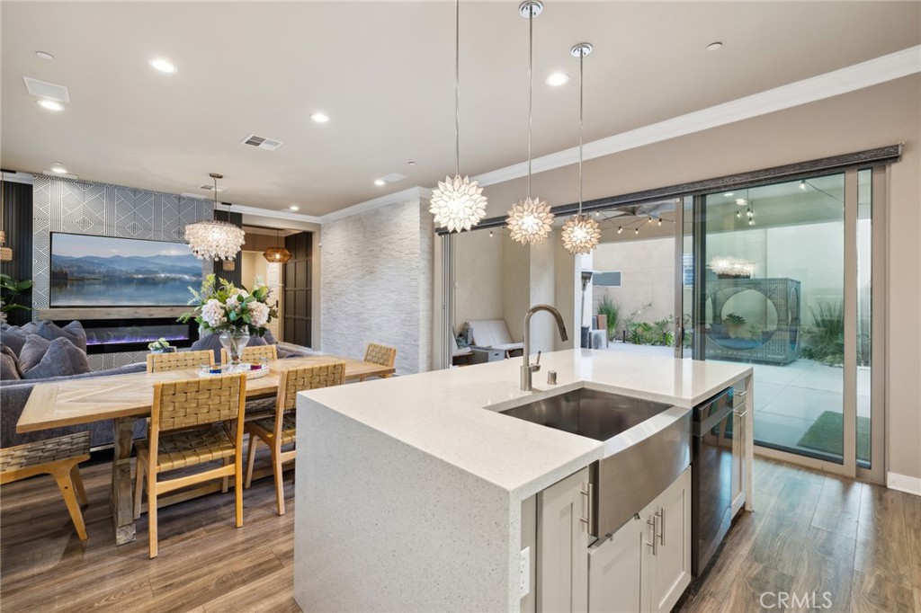 a kitchen with counter top space and stainless steel appliances