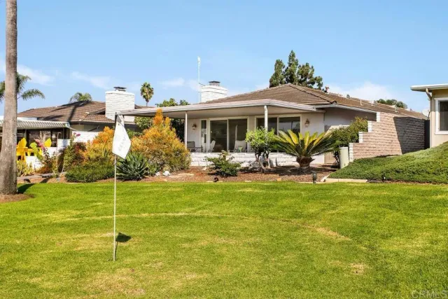a house view with a garden space