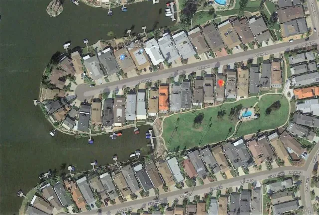 a view of swimming pool with a table and chairs
