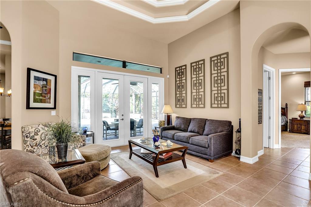 281 19th Street Southwest Naples, FL 34117 - Photo 5 of 35 Living room with master off to the right