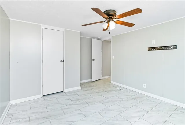 a view of a room with wooden walls