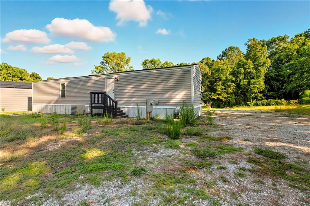 221 McAllister Road Cornelia, GA 30531 - Photo 30 of 58 a view of a houses with a yard