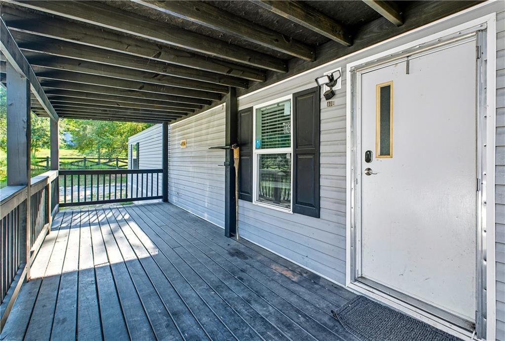 221 McAllister Road Cornelia, GA 30531 - Photo 3 of 58 a view of porch with wooden floor