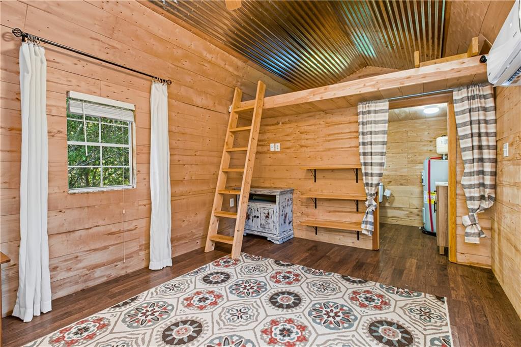 221 McAllister Road Cornelia, GA 30531 - Photo 38 of 58 a bedroom with a bed and a window