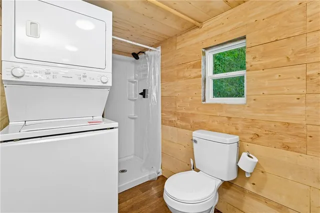 a kitchen with a stove a sink and a refrigerator