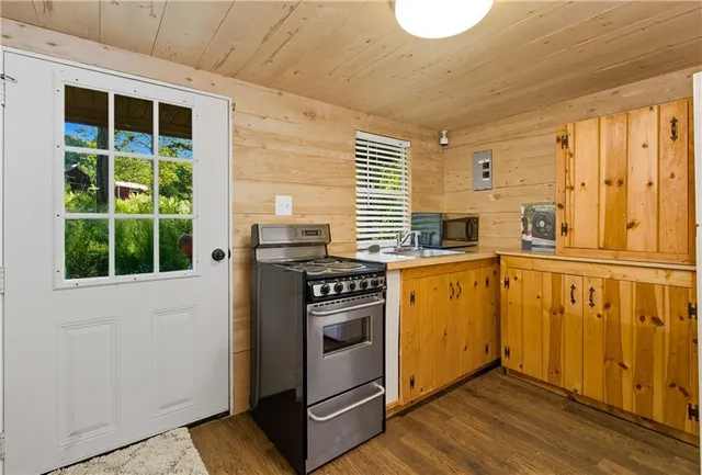 a backyard of a house with lots of green space