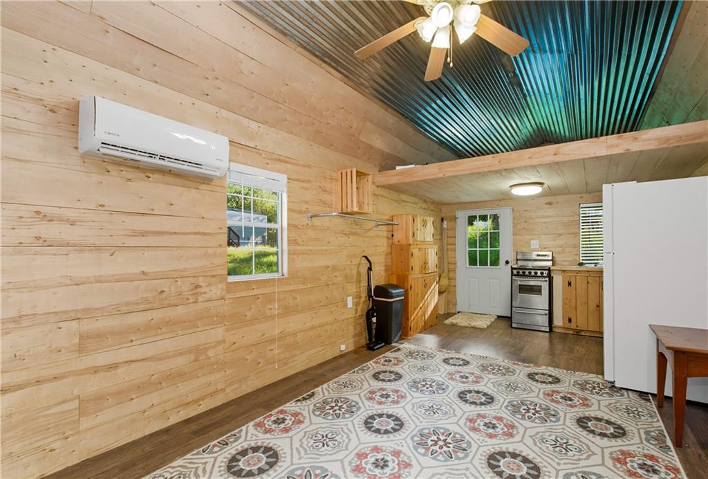 221 McAllister Road Cornelia, GA 30531 - Photo 46 of 58 a bathroom with a bathtub and a shower