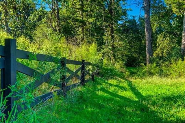 a view of swimming pool and mountain in the background