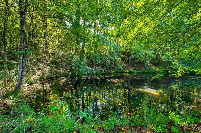 a view of a kitchen with a sink and a window