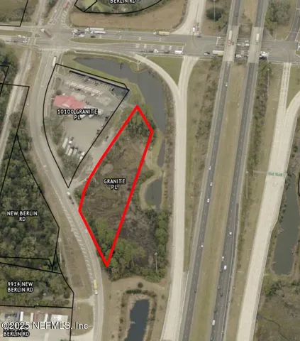 a picture of a bathroom with a shower and door