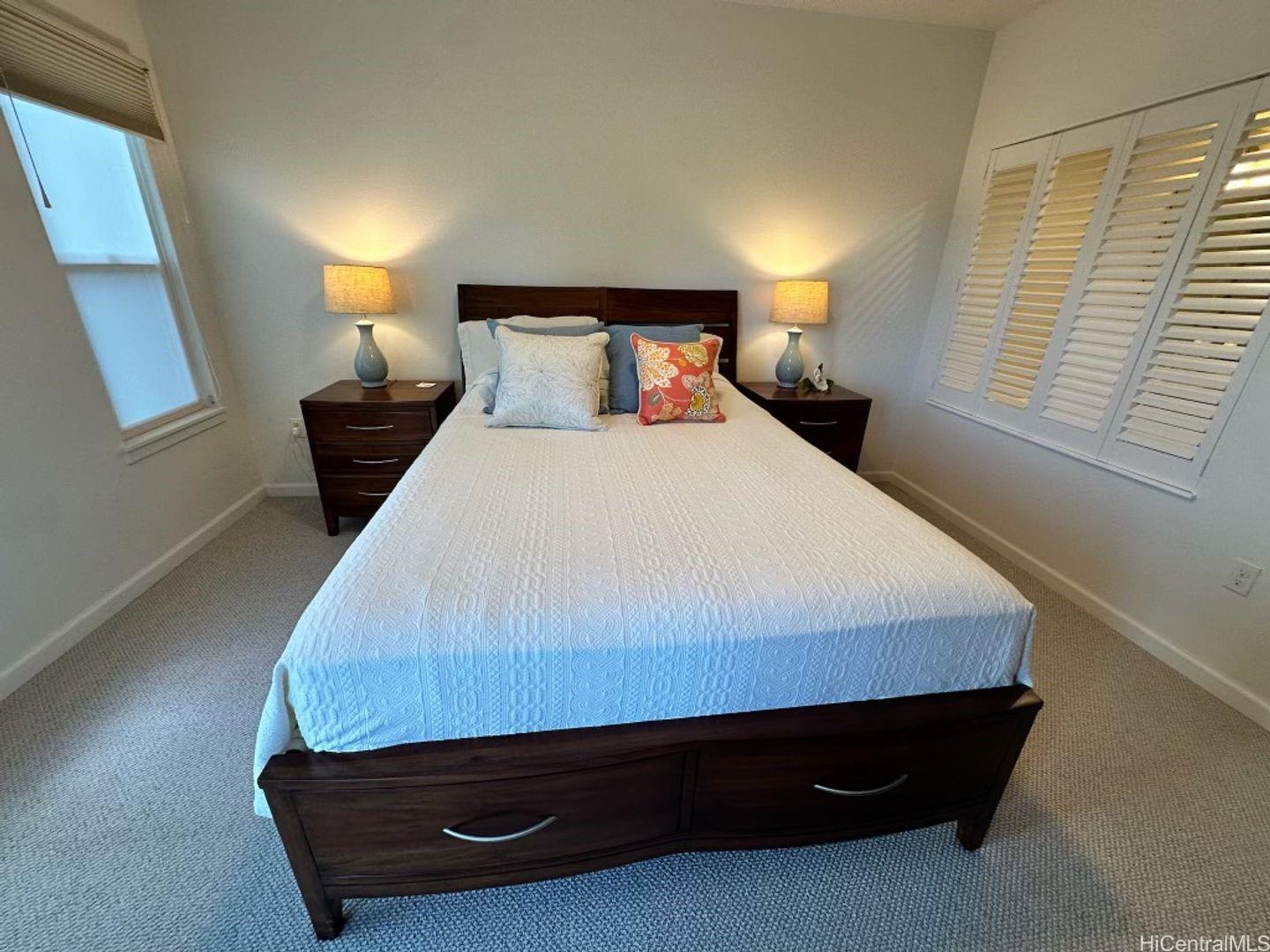 361 Kailua Road, Unit RD8205 Kailua, HI 96734 - Photo 12 of 23 a bedroom with a bed and window