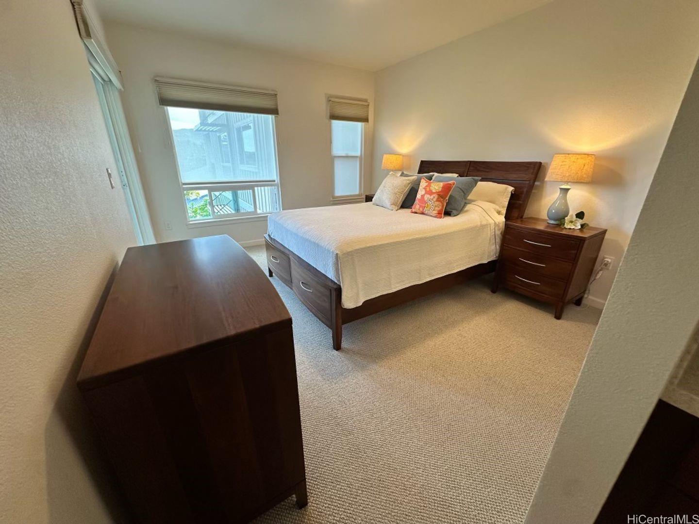 361 Kailua Road, Unit RD8205 Kailua, HI 96734 - Photo 14 of 23 a bedroom with a bed and window