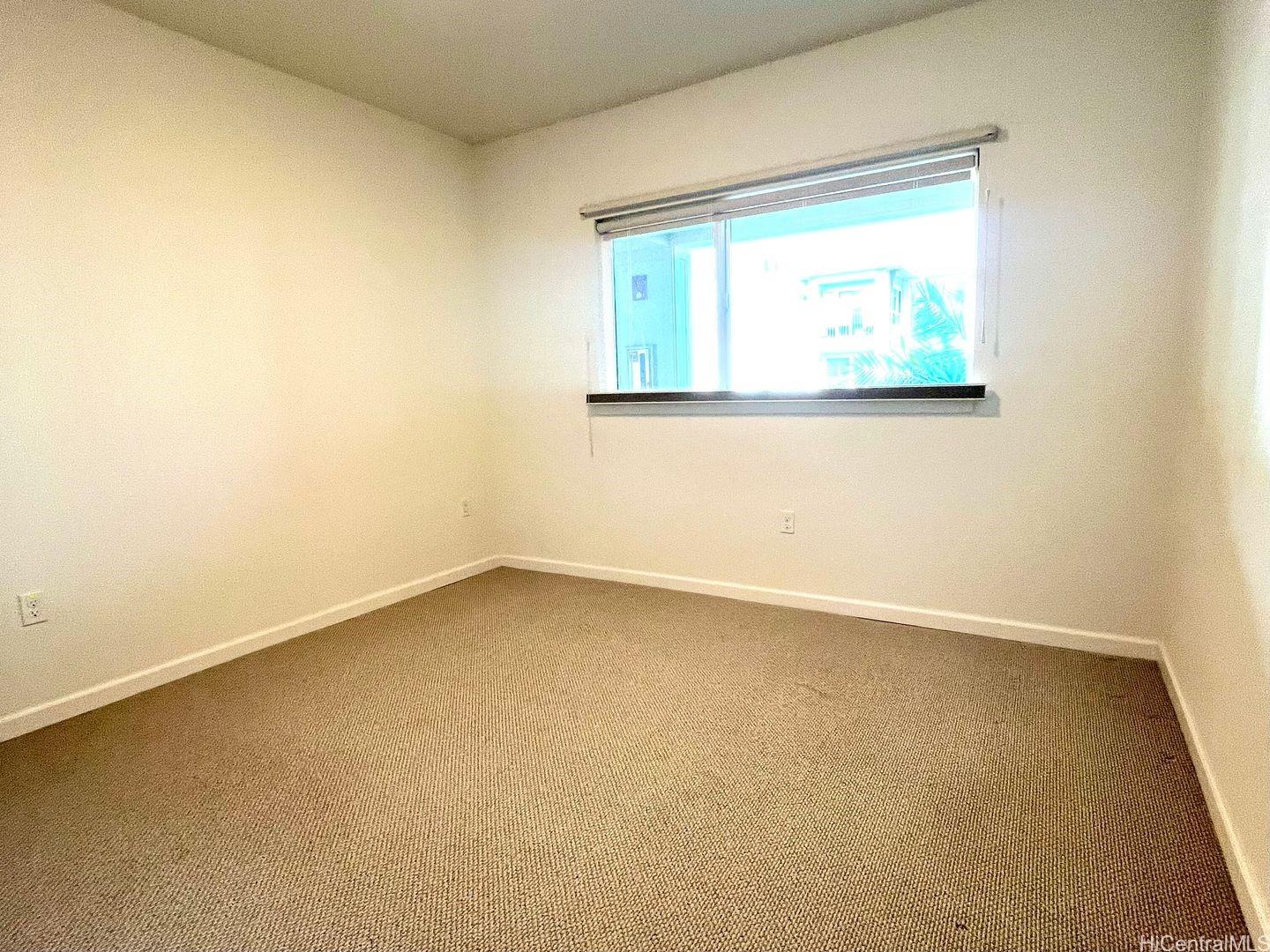 361 Kailua Road, Unit RD8205 Kailua, HI 96734 - Photo 18 of 23 an empty room with a window