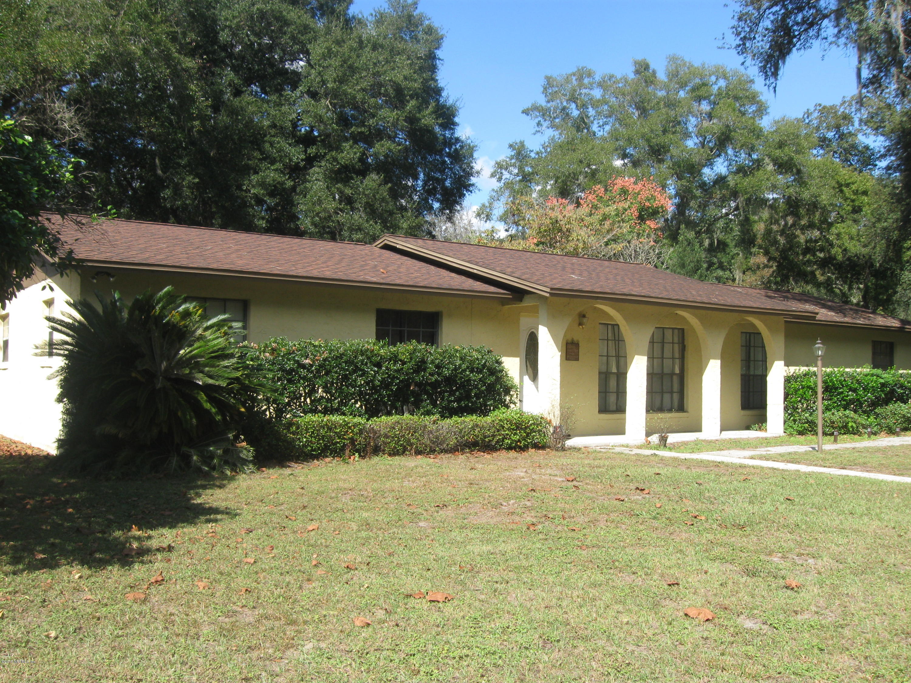 5535 Weaver Road Orange Park, FL 32073 - Photo 1 of 31 a front view of a house with a yard