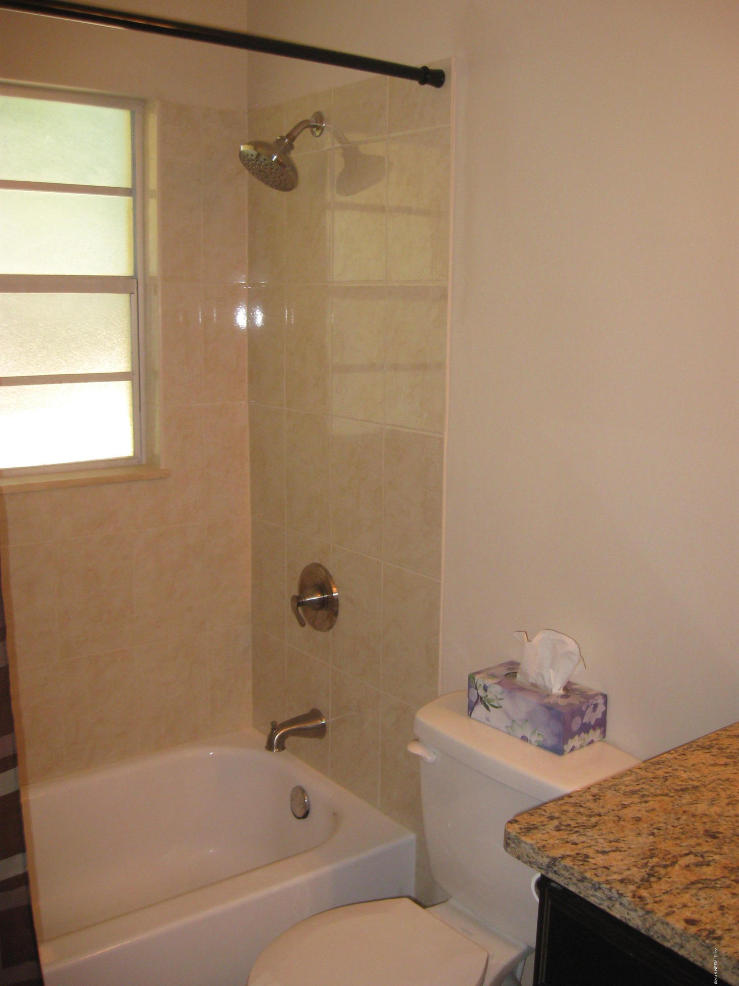 5535 Weaver Road Orange Park, FL 32073 - Photo 13 of 31 a bathroom with a granite countertop sink and a mirror