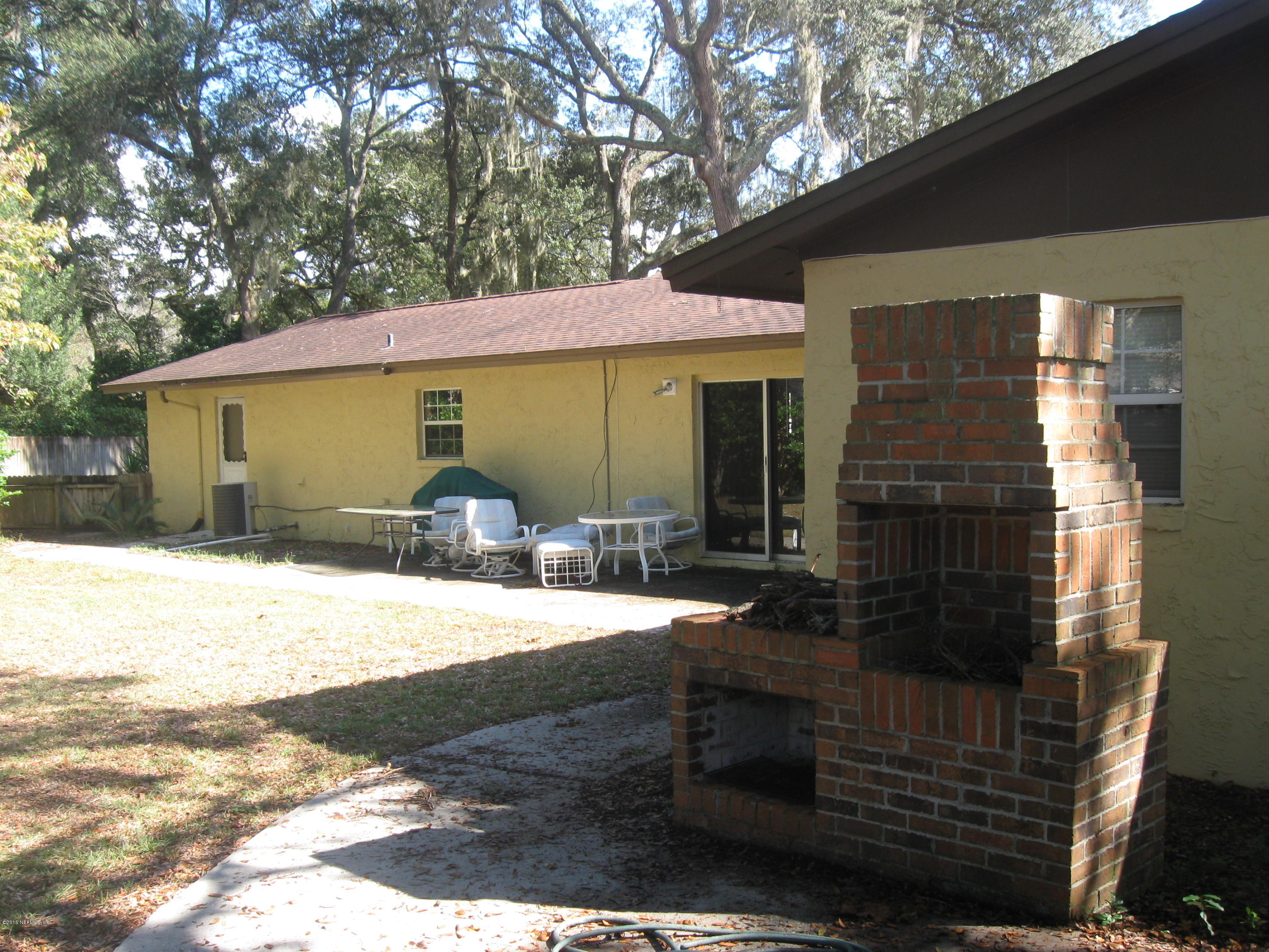 5535 Weaver Road Orange Park, FL 32073 - Photo 29 of 31 a front view of a house with garden