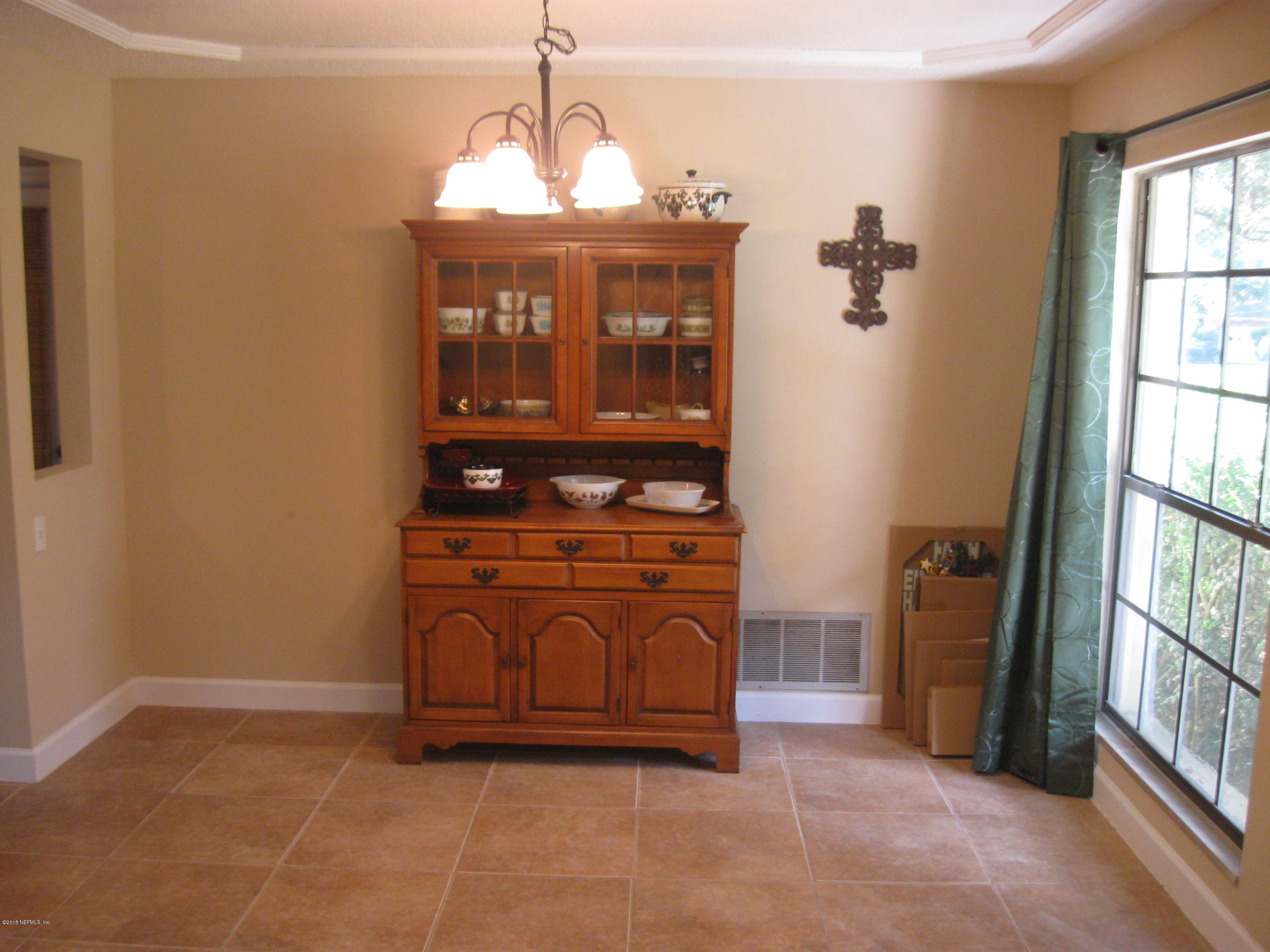 5535 Weaver Road Orange Park, FL 32073 - Photo 8 of 31 a view of a storage & utility room