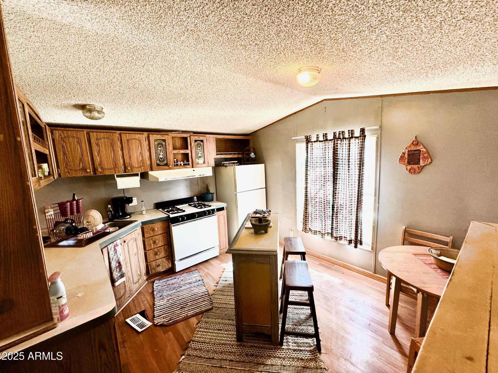3527 Broken Arrow Road Overgaard, AZ 85933 - Photo 2 of 9 kitchen