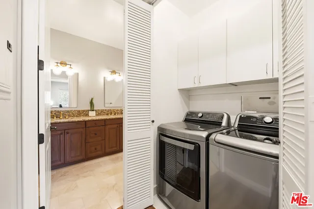 a kitchen with a stove and a sink