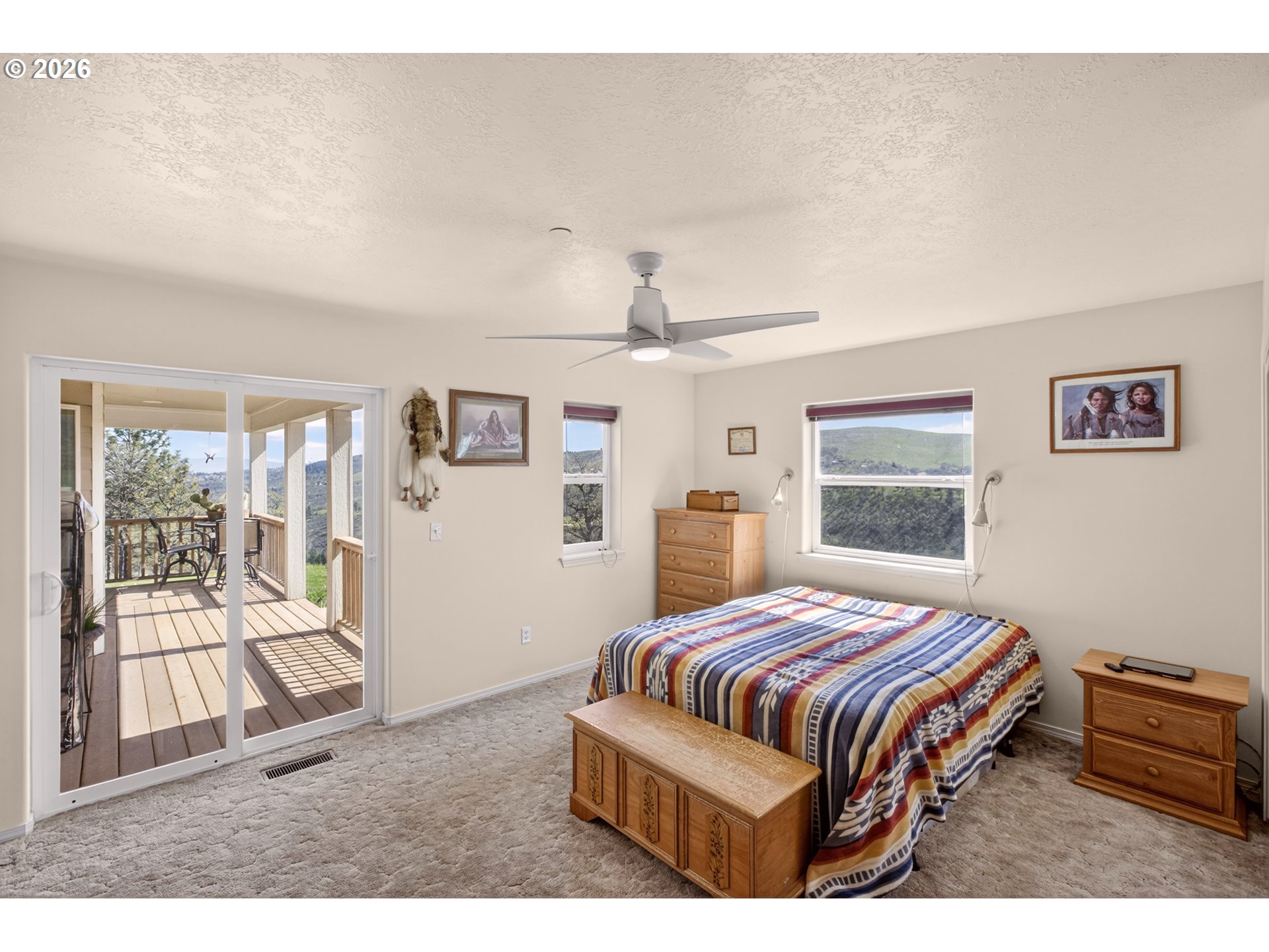 4377 Browns Creek Road The Dalles, OR 97058 - Photo 13 of 38 a bedroom with a bed and wooden floor